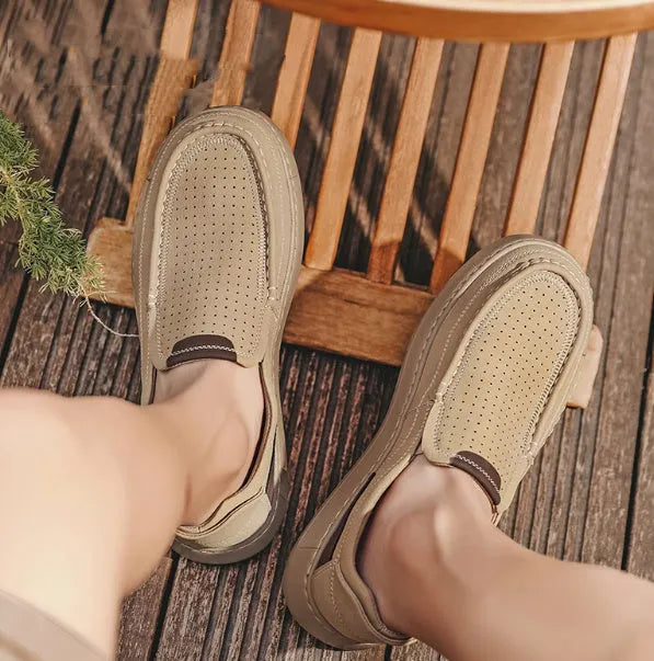 Men's breathable hollow leather slip-on casual shoes in black with two-layer cowhide upper