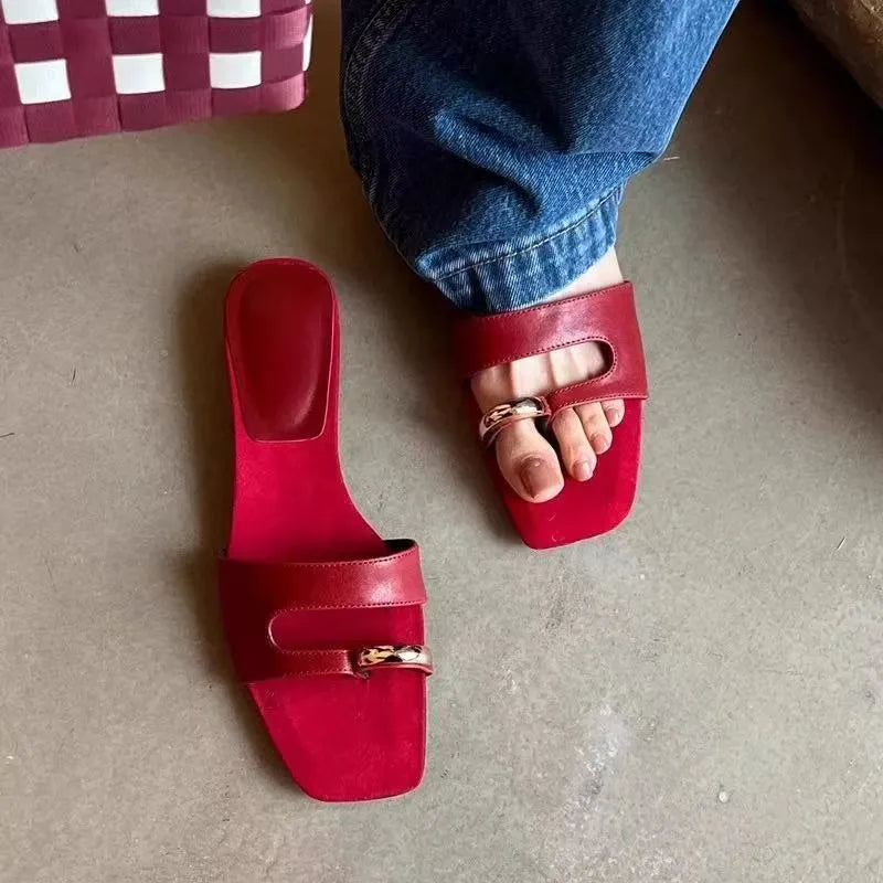 Leather outdoor slippers with rubber soles in black, white, red, and silver colours with square head design