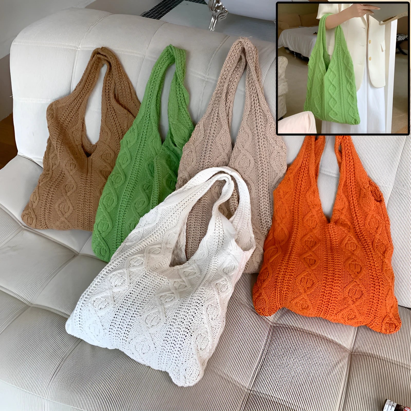 GWomens beige knitted tote bag with double shoulder straps on a wooden table.