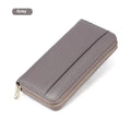 Long genuine leather women's wallet in a choice of colours, shown open to display multiple card slots and a large main compartment.