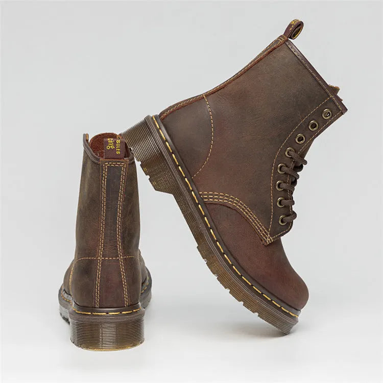 Crazy Horse leather Martin boots with round toe, wedge heel, and front lace-up closure on a white background