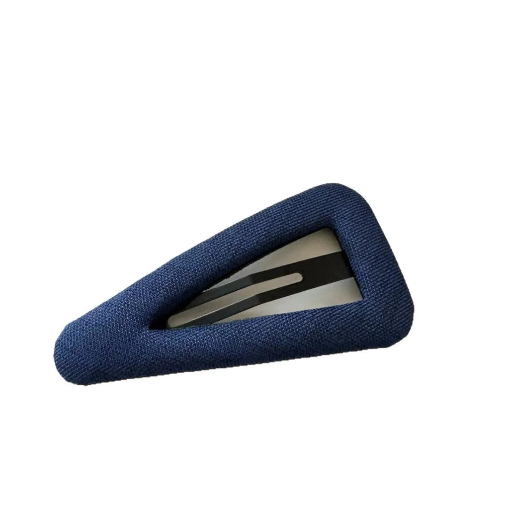 Retro style hair barrettes in dark denim and polka dot patterns, showing triangle and water drop shapes.
