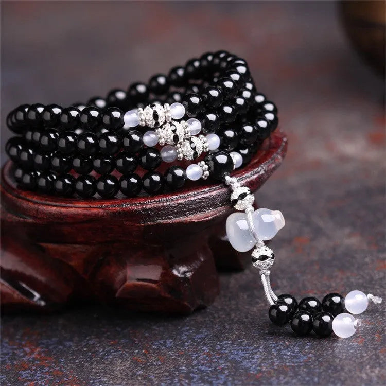 Natural black and red agate 108-bead bracelet with geometric shapes
