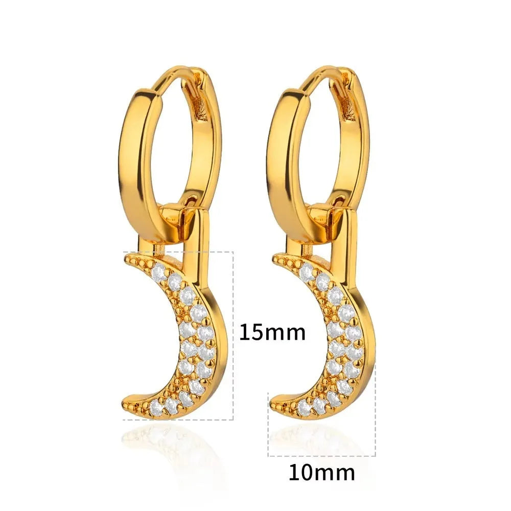 Women's geometric butterfly-shaped copper earrings with heart and star details in various colours.