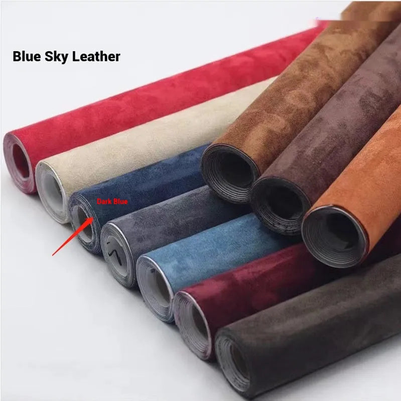 Roll of self-adhesive leather suede fabric in BMW brown colour next to a car dashboard.