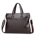 Men's black and brown PU leather shoulder messenger bag with splicing design, 35x30x4cm size.