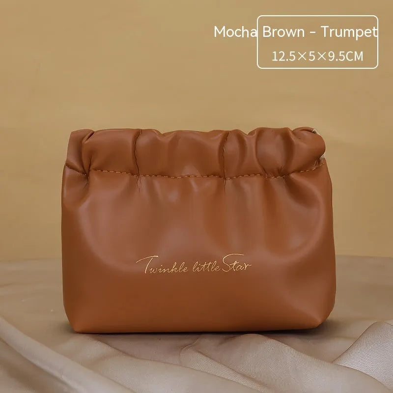 Leather large capacity travel toiletry bag in caramel mocha colour with letter design and dry wet separation compartments
