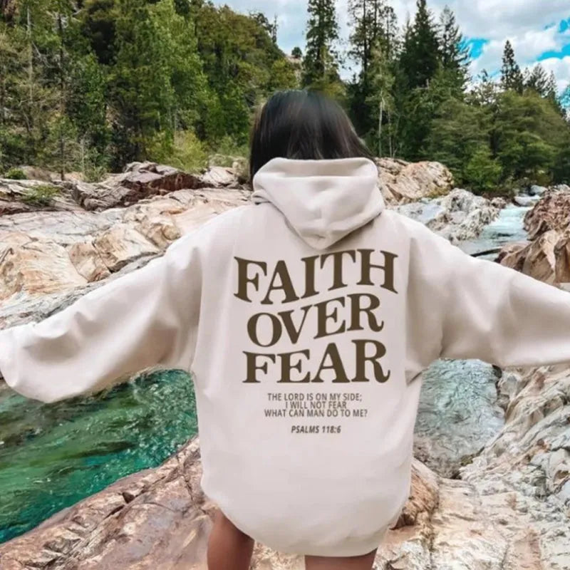 Faith Over Fear Christian hoodie unisex cotton blend pullover with drawstring hood and drop shoulder, shown in light gray.