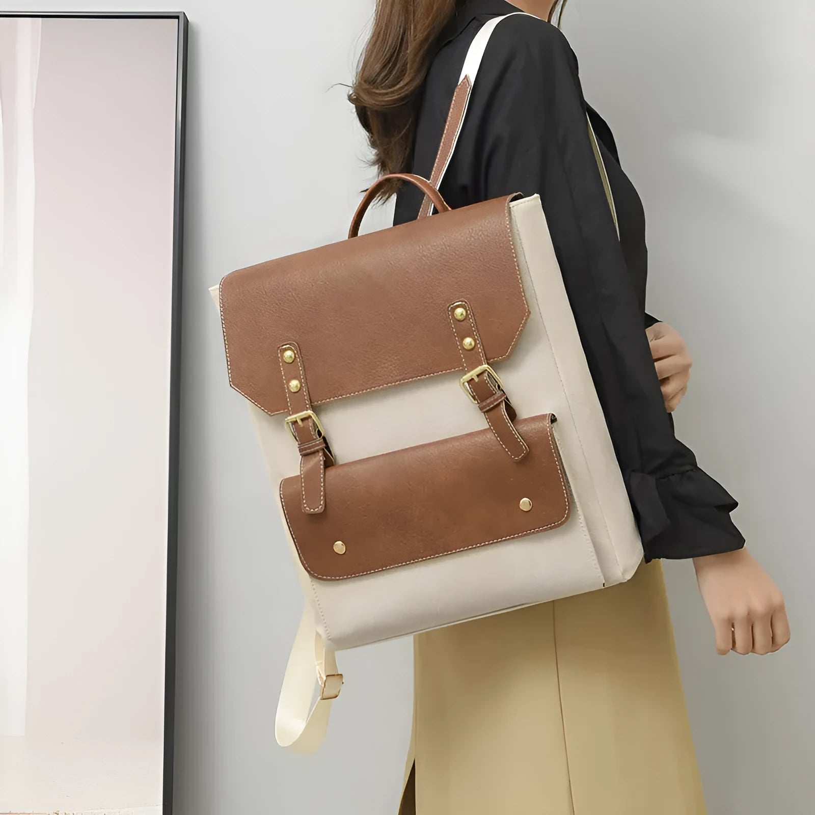 Soft brown retro Korean style PU backpack showing front view and ventilation detail.