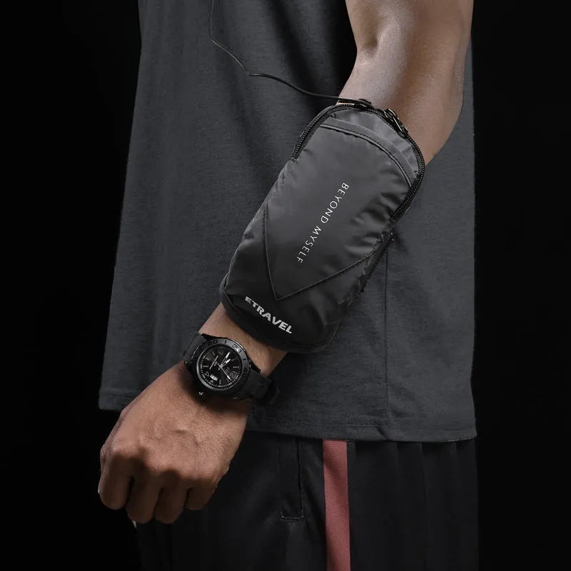 Reflective black running arm bag with adjustable strap, holding a mobile phone, shown on a runner's arm.