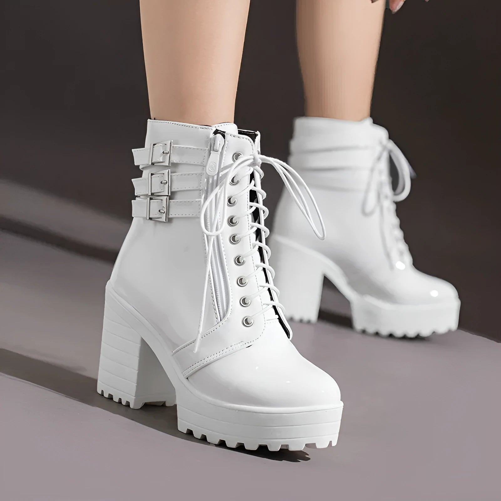 Women's black thick-heeled short boots with lace-up front and waterproof platform