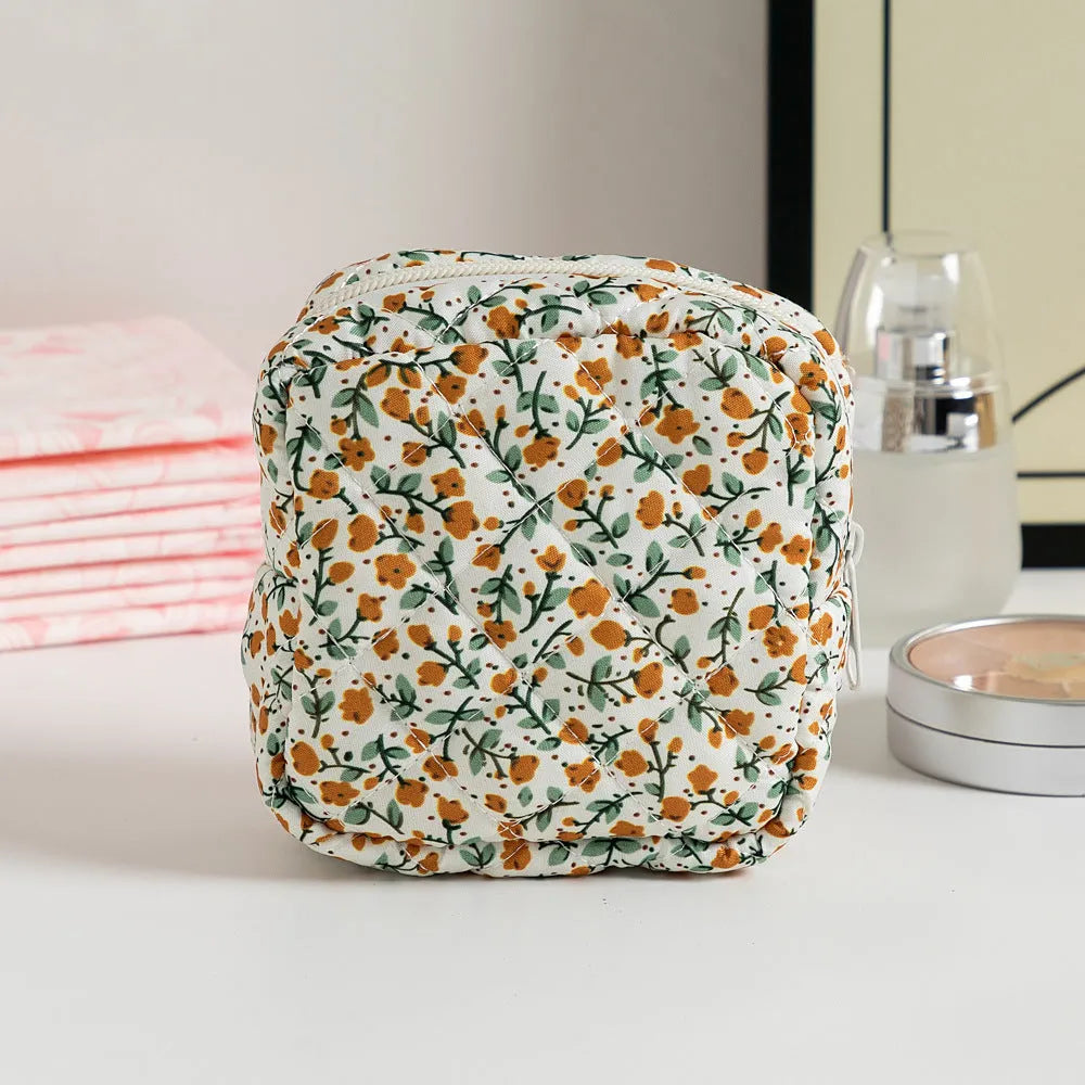 Floral pattern key storage bag made from breathable polyester fabric in various colour options.