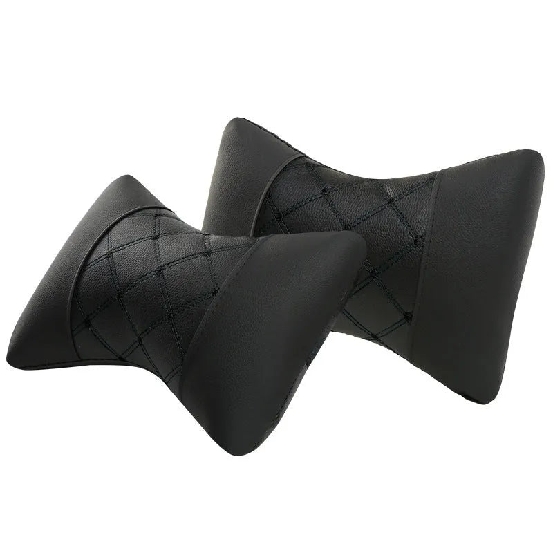 Black leather quilted car headrest pillow with diamond pattern for neck support.