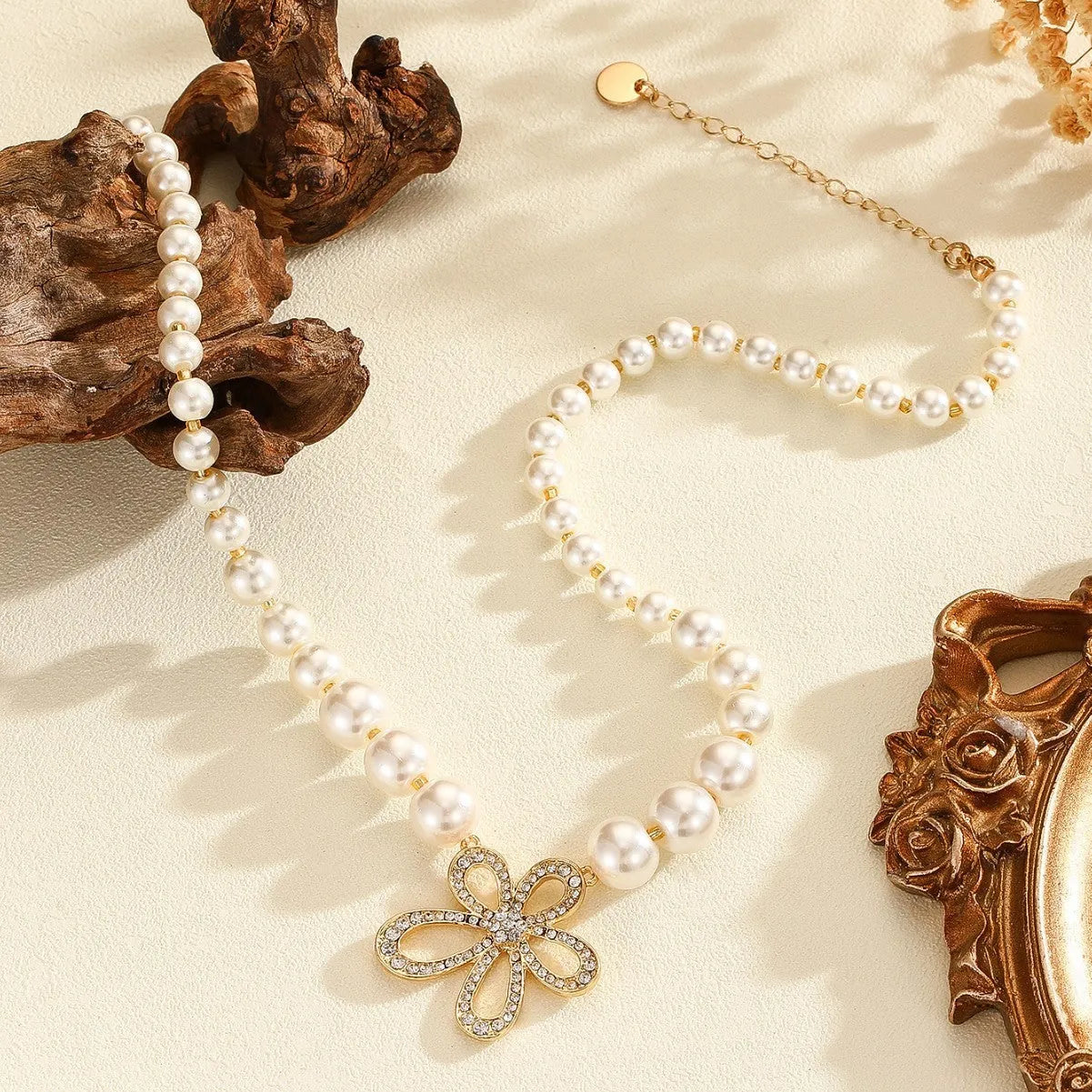 French romantic flower pendant necklace in silver tone with adjustable chain on white background
