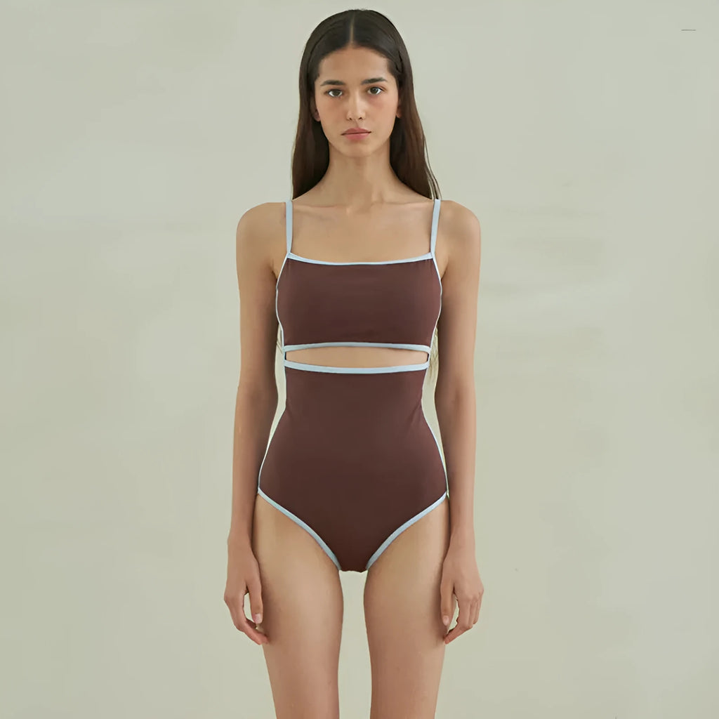 Brown one-piece swimsuit for women on a mannequin, showing the front design.