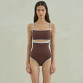 Brown one-piece swimsuit for women on a mannequin, showing the front design.
