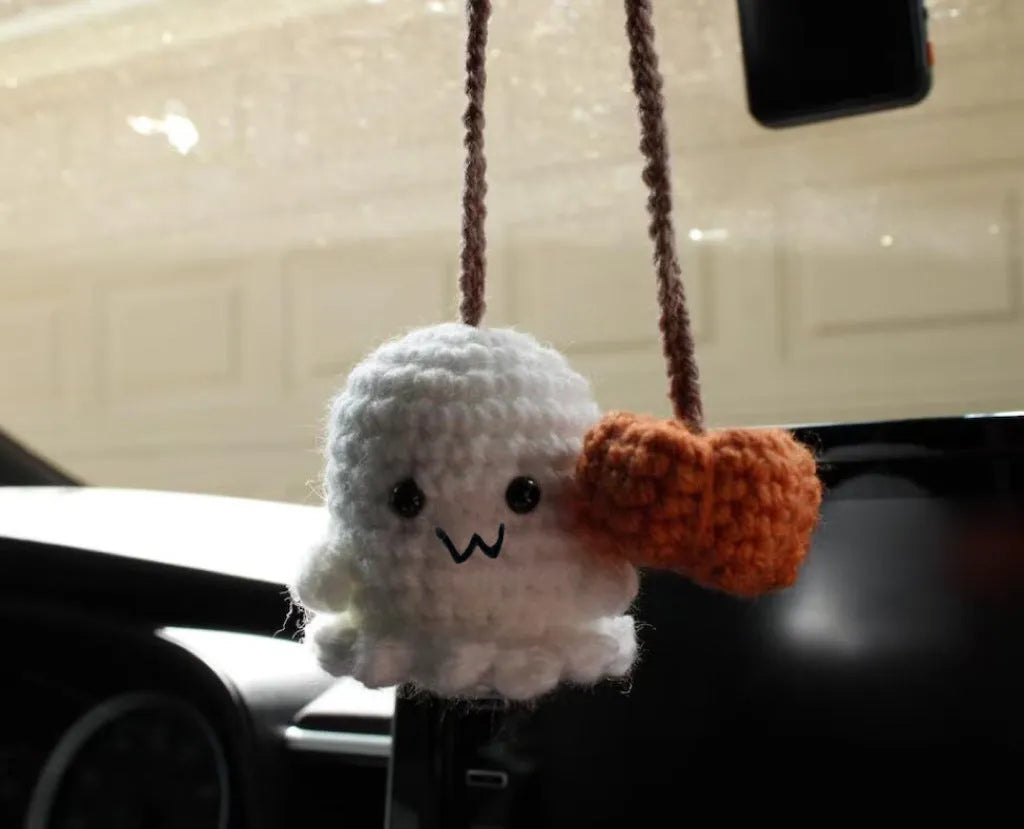 Plush hand-woven car hanging ornament in a cartoon design, made from soft polyester fabric.