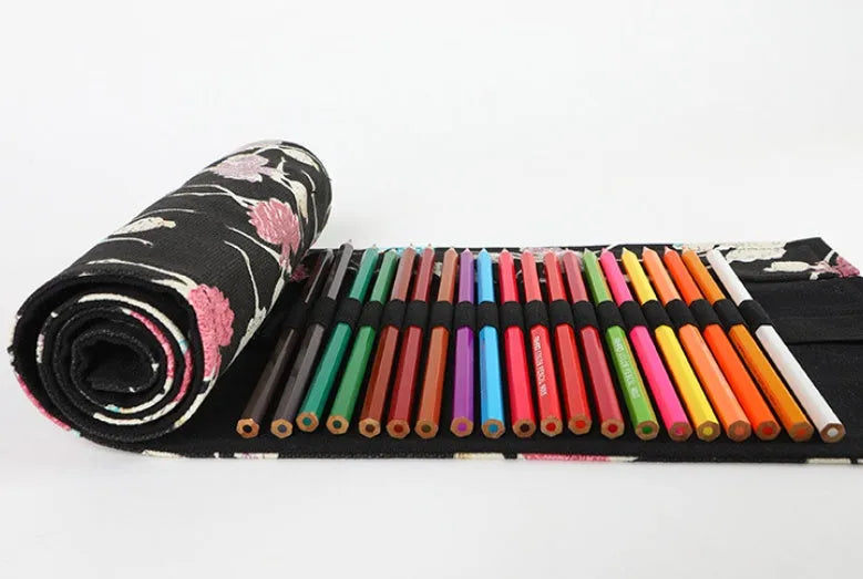 Square canvas rolling pencil case with ballet girl print, showing multiple holes for pencils