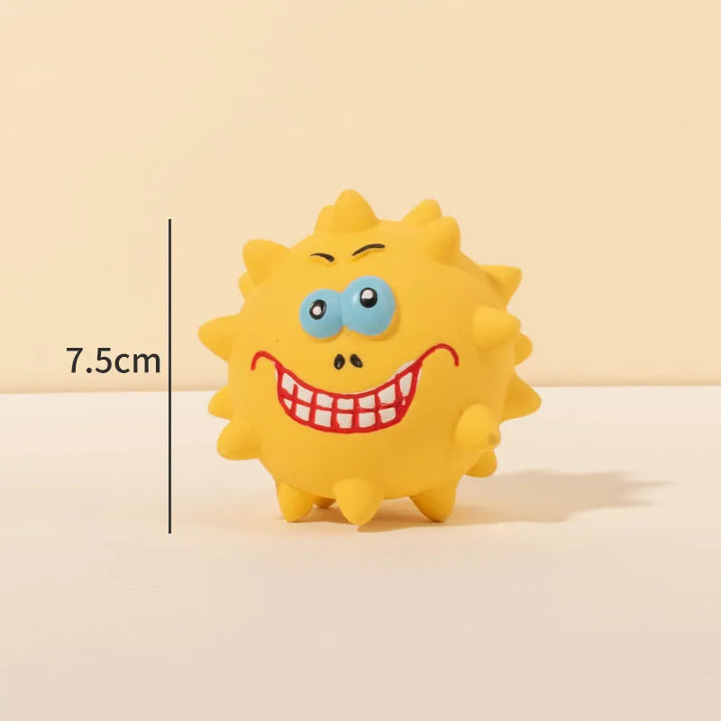 Four colourful squeaky dog balls with textured surfaces and cute faces