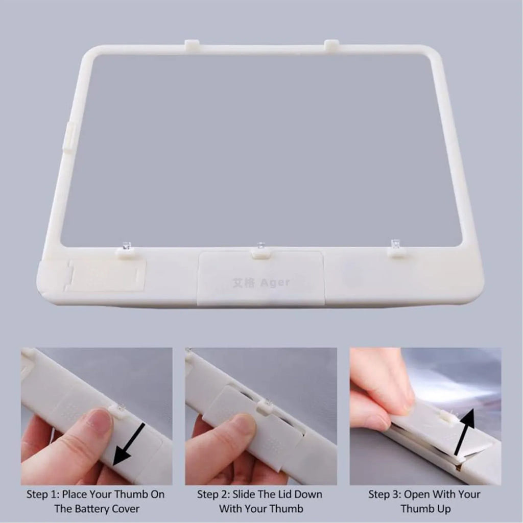 Black illuminated magnifying glass with 3x magnification and LED reading light on white background