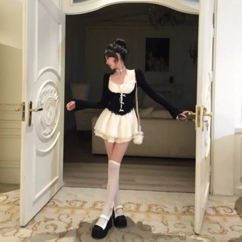 Women's two-piece princess style lace suspender dress suit with knitted blouse and skirt in beige