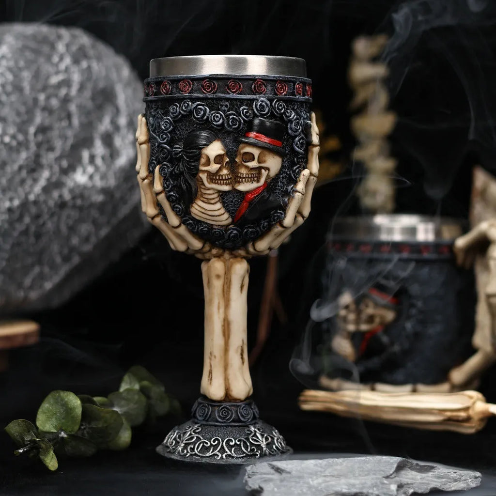 Stainless steel red wine glass with resin skeleton couple decoration, 200ml capacity