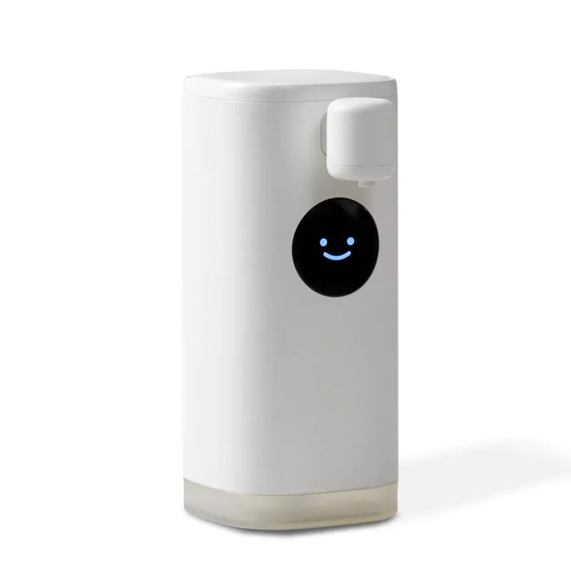 White Smile automatic hand washing machine with intelligent induction sensor mounted on a wall showing foam dispensed into a hand