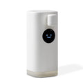 White Smile automatic hand washing machine with intelligent induction sensor mounted on a wall showing foam dispensed into a hand