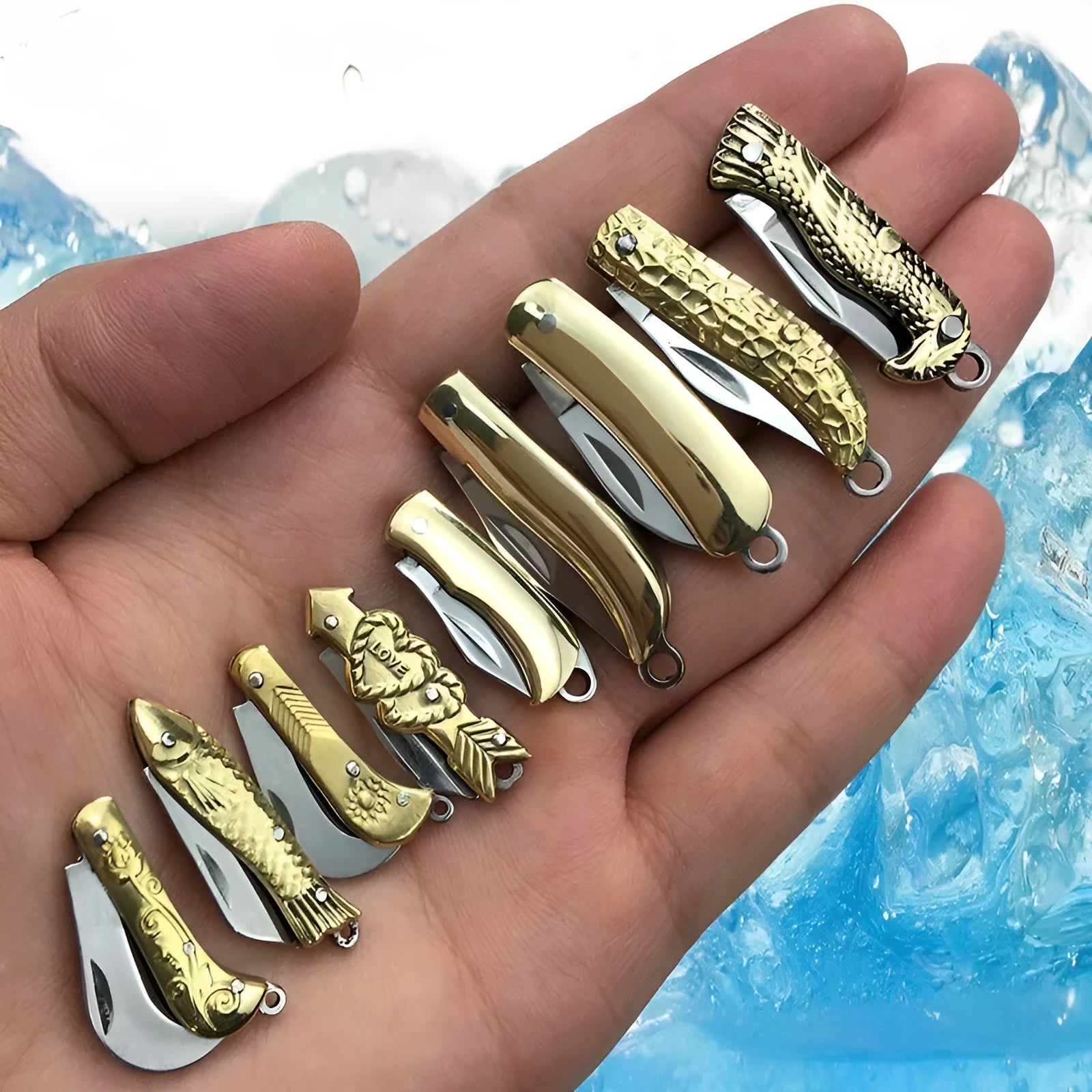 Brass mini folding knife keychain pendant with 3cm blade open showing brass body and compact size