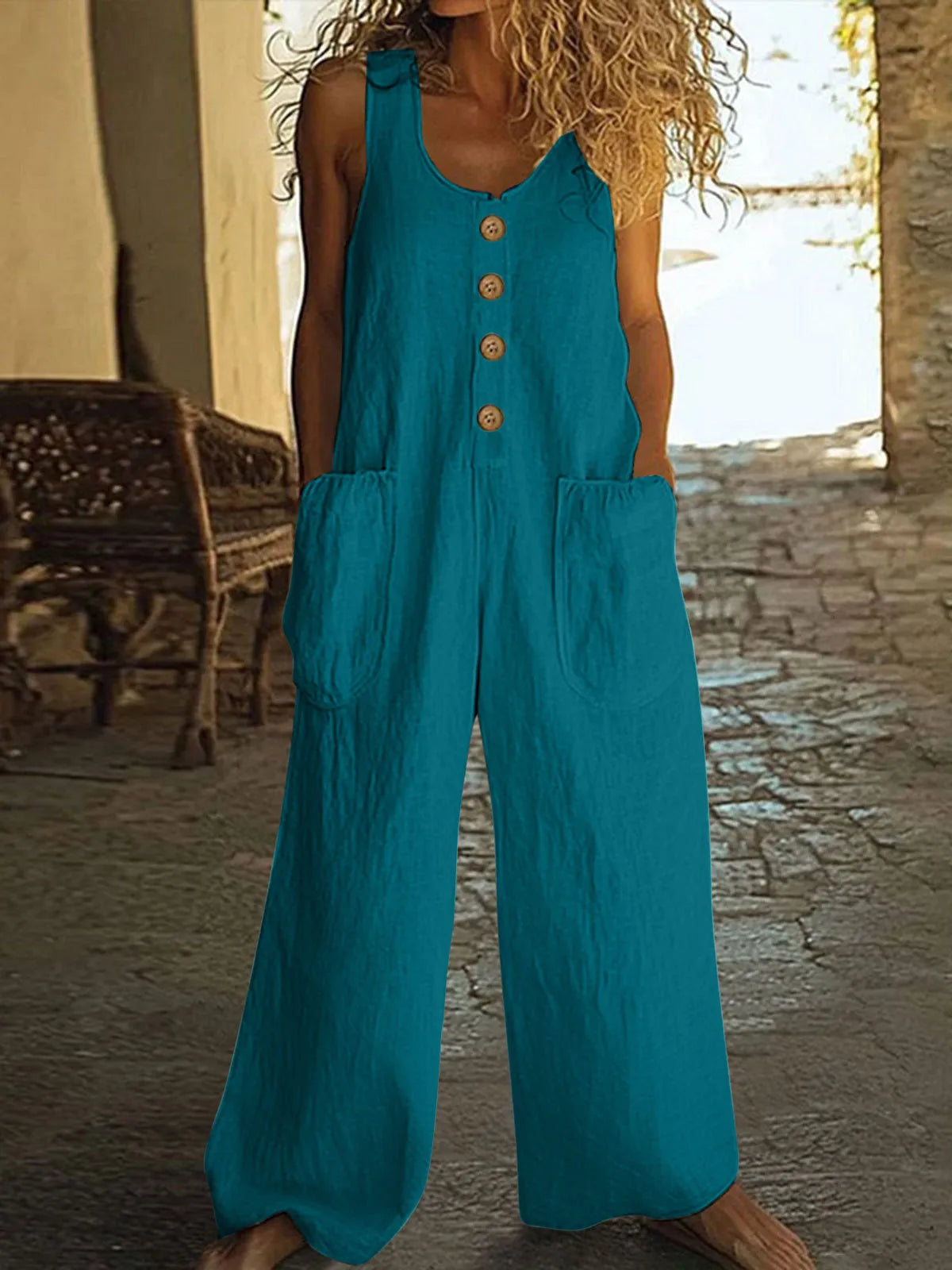 Sleeveless wide leg cotton jumpsuit in peacock green colour with pockets and elasticated waist