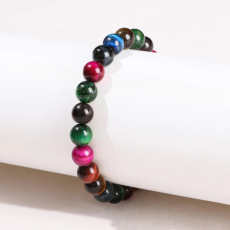 Colourful Tiger Eye bracelet showing mixed 6mm 8mm 10mm 12mm bead sizes on string
