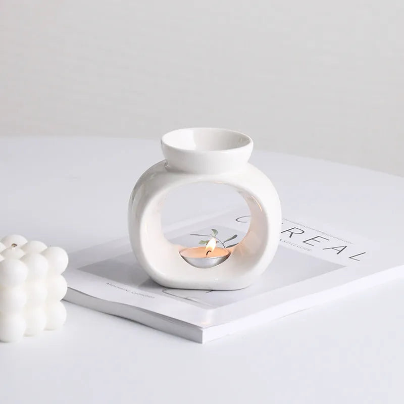 White Nordic style ceramic aromatherapy stove ornament with anti-dry burning decorative design
