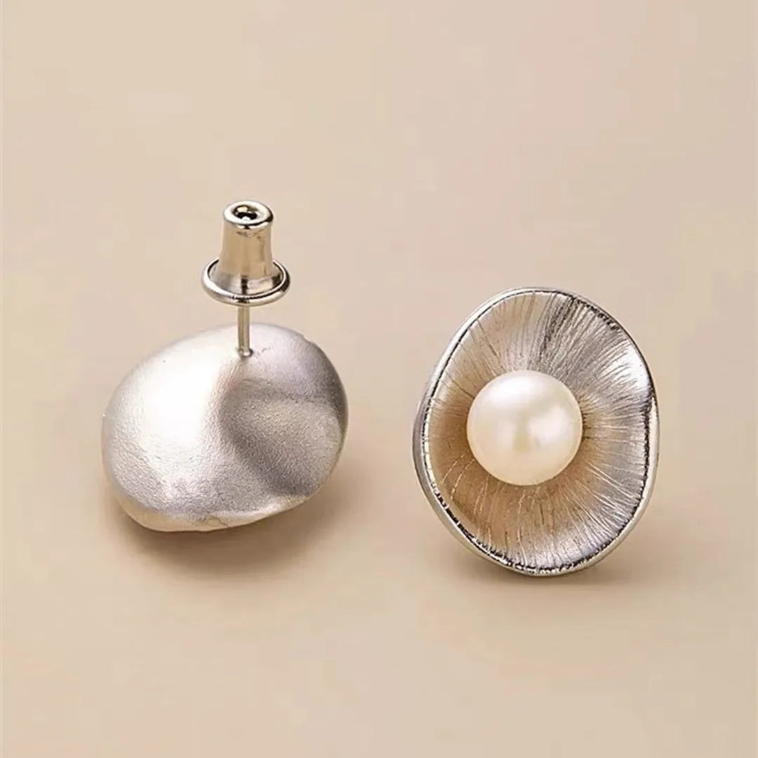 Gold geometric earrings with freshwater pearls on sterling silver posts and butterfly clasps