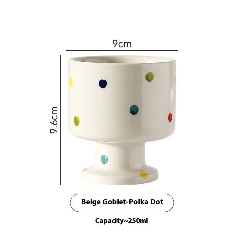 Hand-pinched irregular ceramic mug in a solid colour, showing its unique shape and modern design.