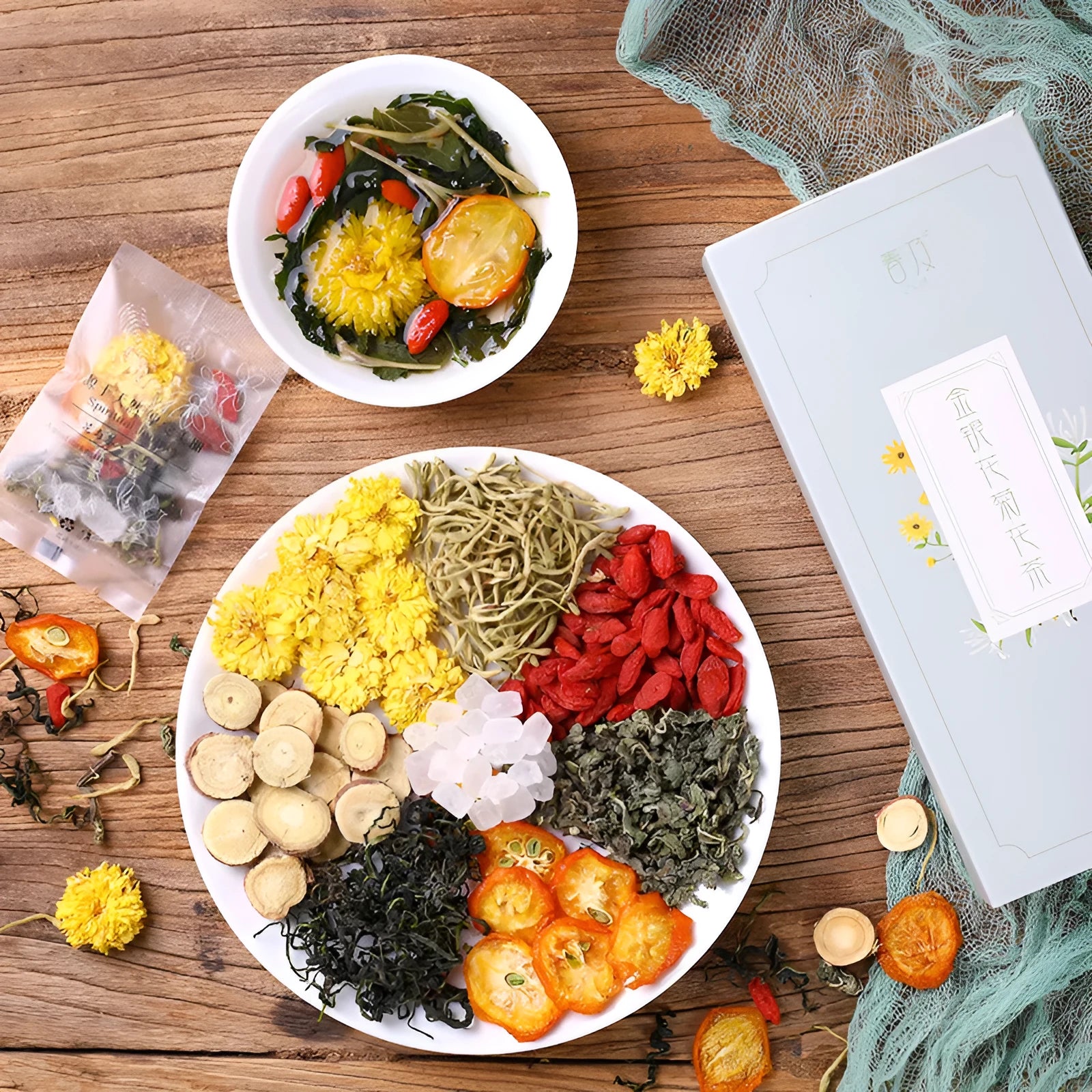 Honeysuckle chrysanthemum tea bags packaging showing 150g net content with optional gift tea cups
