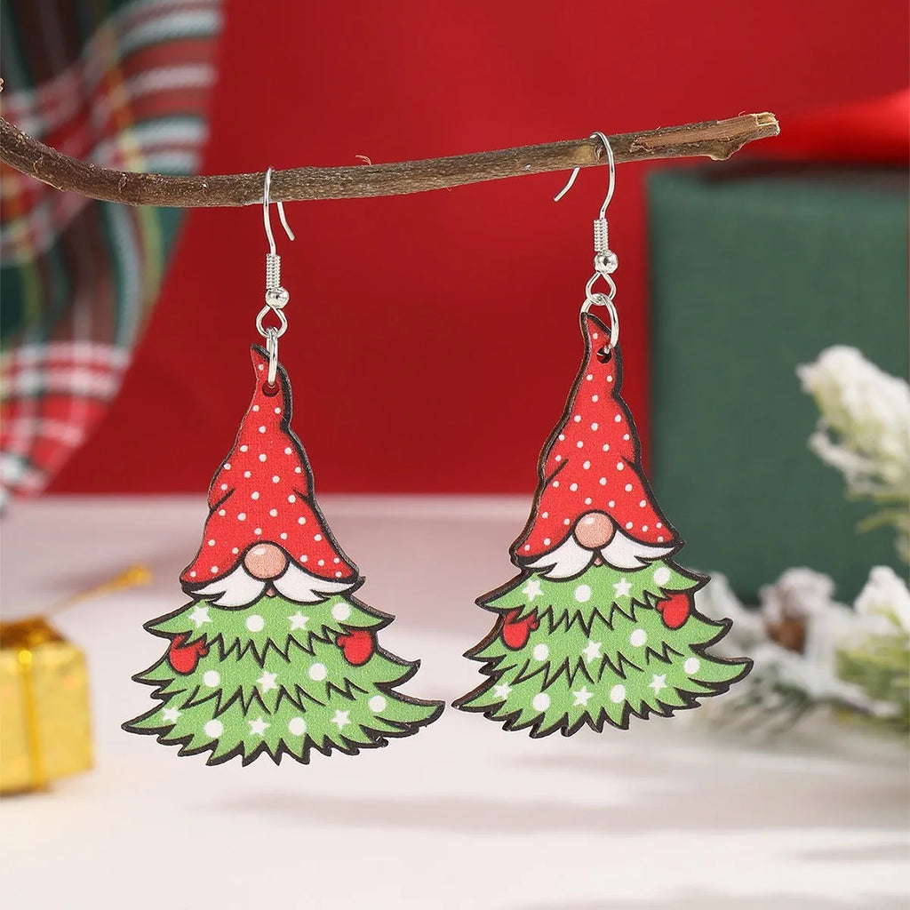 Women's wooden Christmas earrings with printed tree and snowman designs and Santa motifs.