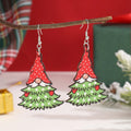 Women's wooden Christmas earrings with printed tree and snowman designs and Santa motifs.