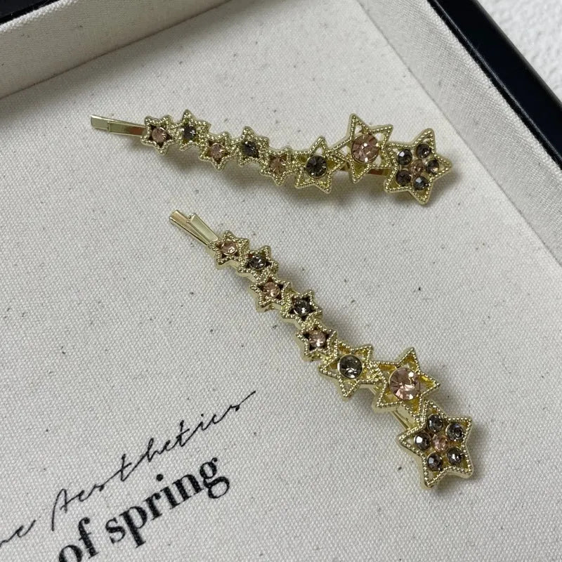Gold Korean style rhinestone barrette with five-pointed star decoration and side clip for bangs
