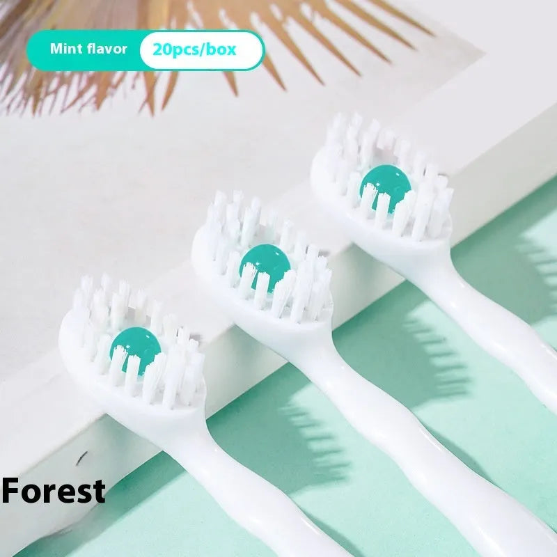 Box of 20 disposable bead toothbrushes in compact packaging for travel hygiene.