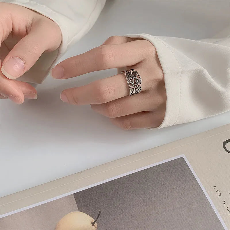 Silver plated open ring with hollow flower design, adjustable opening, retro style, colour retro JZ02137