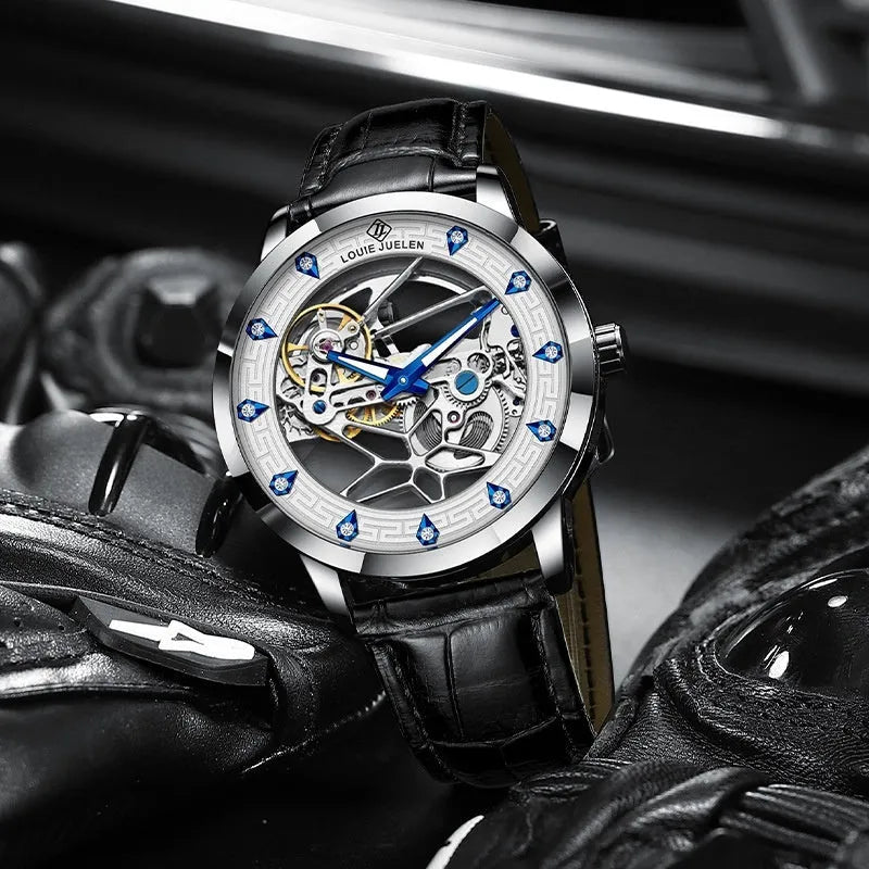 Men's silver case mechanical watch with white dial, blue luminous hands, and a black genuine leather strap.