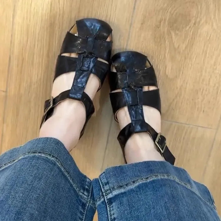 Women's Roman shoes in apricot colour with woven upper, buckle fastening, round toe, and low rubber sole