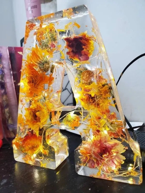 Transparent resin night light ornament with letter flower design, 15cm square, multiple colour options
