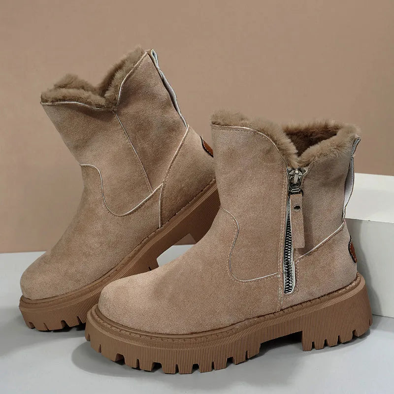 Women's black thick plush snow boots with side zipper and faux suede upper on a non-slip rubber sole.