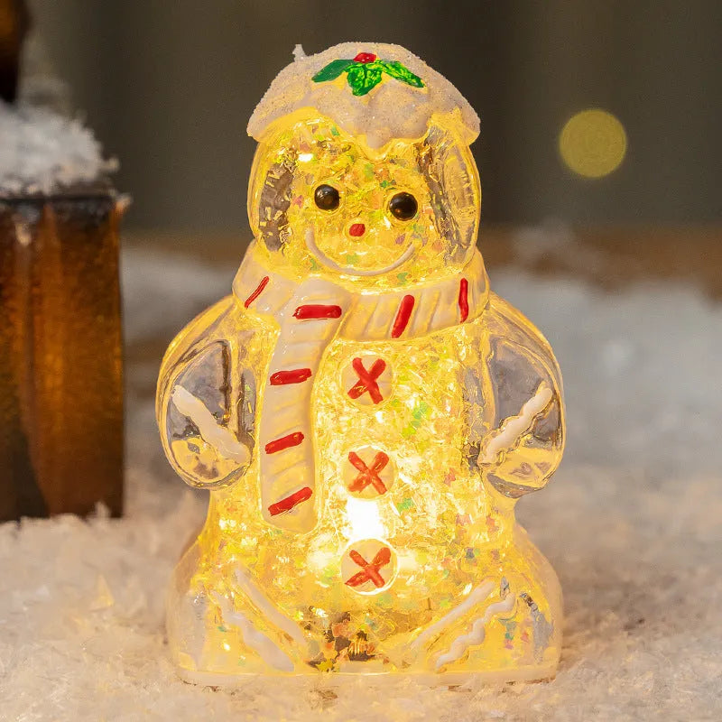 Glowing plastic gingerbread man Christmas ornament with LED light and scarf, in four colour variations.