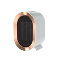 Compact black desktop electric heater with ceramic heating element and mechanical control dial