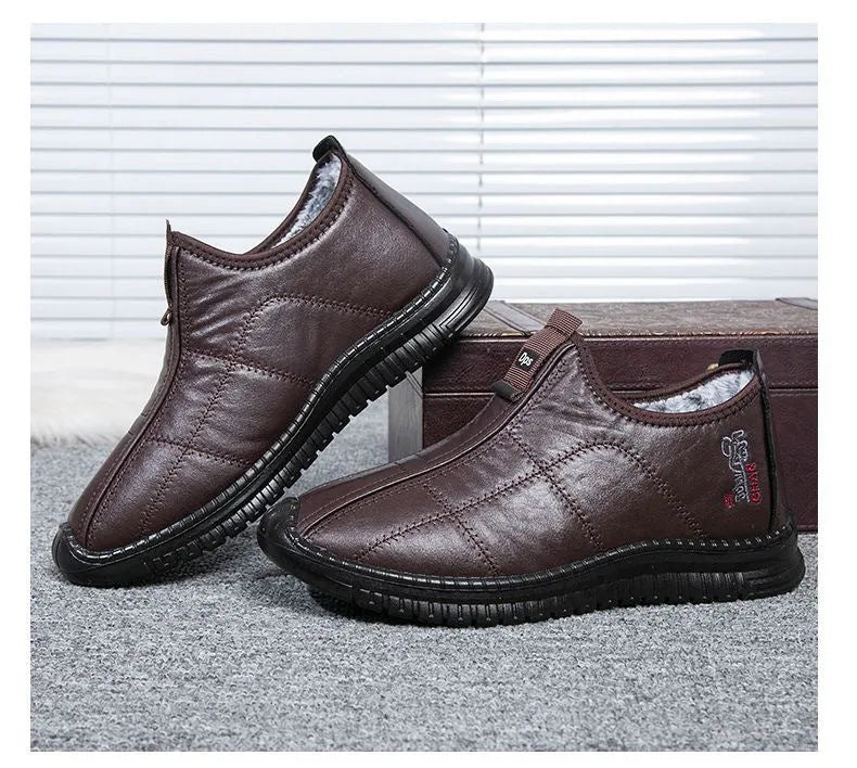 Men's brown winter cotton velvet boots with buckle fastening and a thick non-slip sole.