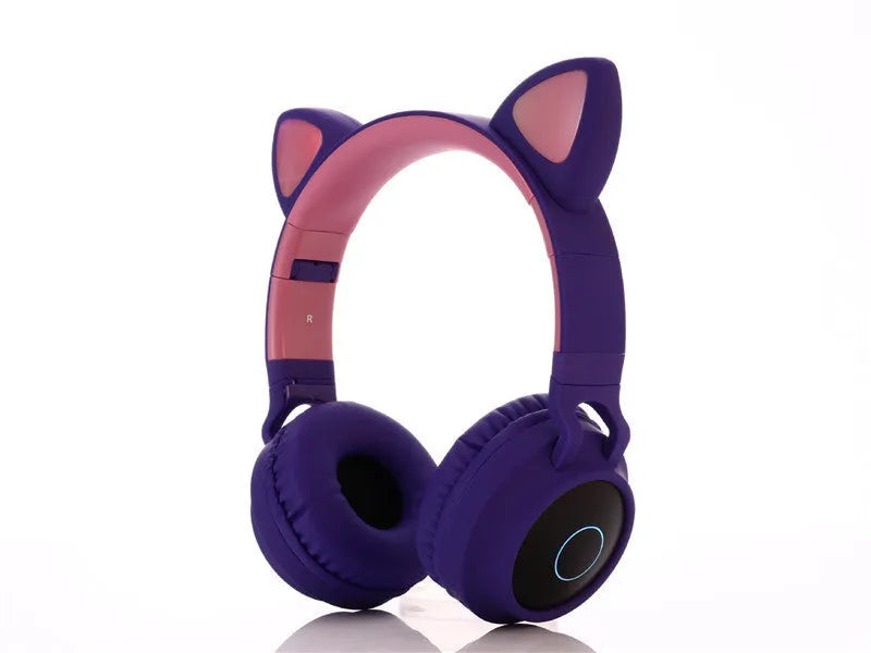 Pink cartoon cat ears wireless Bluetooth gaming headset shown from the side.