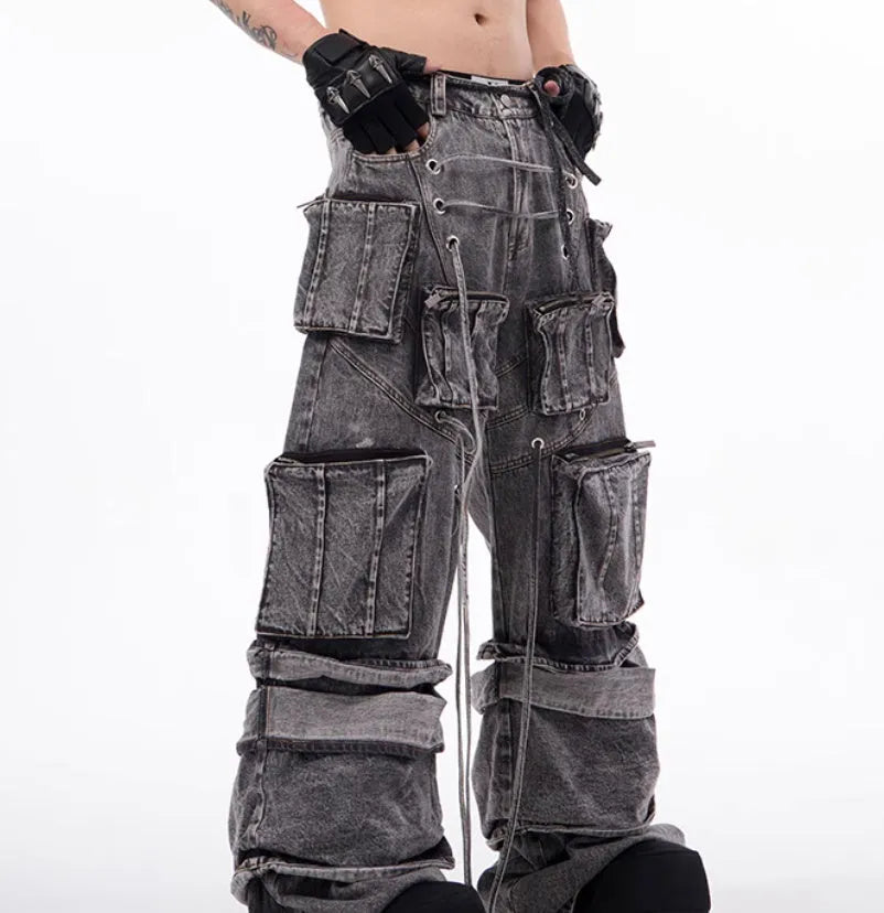 Grey denim distressed overalls with rope stitching and mop pants design