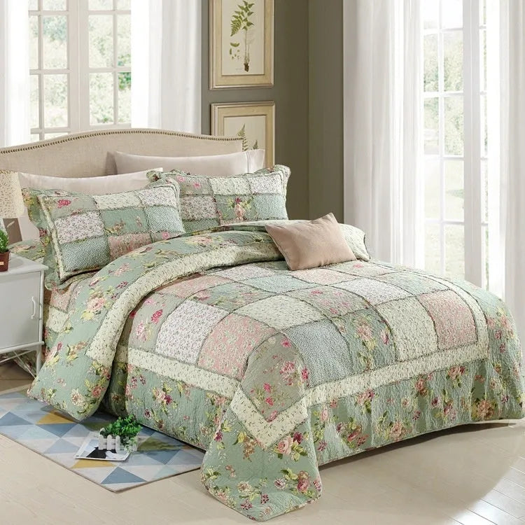 Washed pure cotton quilted bedspread three-piece set in a beige colour, shown on a bed.